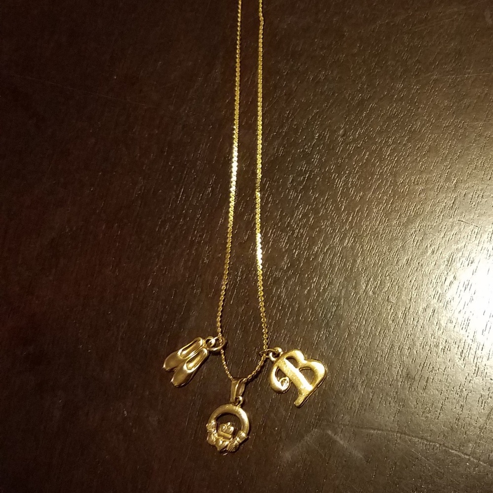 Gold necklace w/ charms